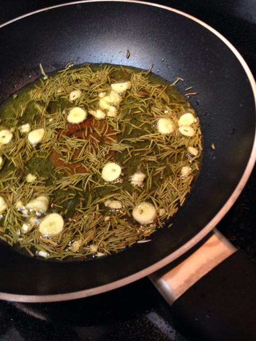 Releasing the flavors of garlic and rosemary over medium heat for perhaps 3 minutes