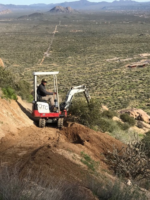 First time I've seen a backhoe doing trail repair